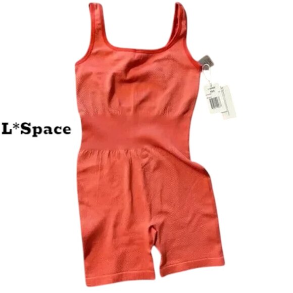 60% OF NWT L*Space Static Biker Ribbed Romper in Cayenne Coral in XS/S MSRP $130